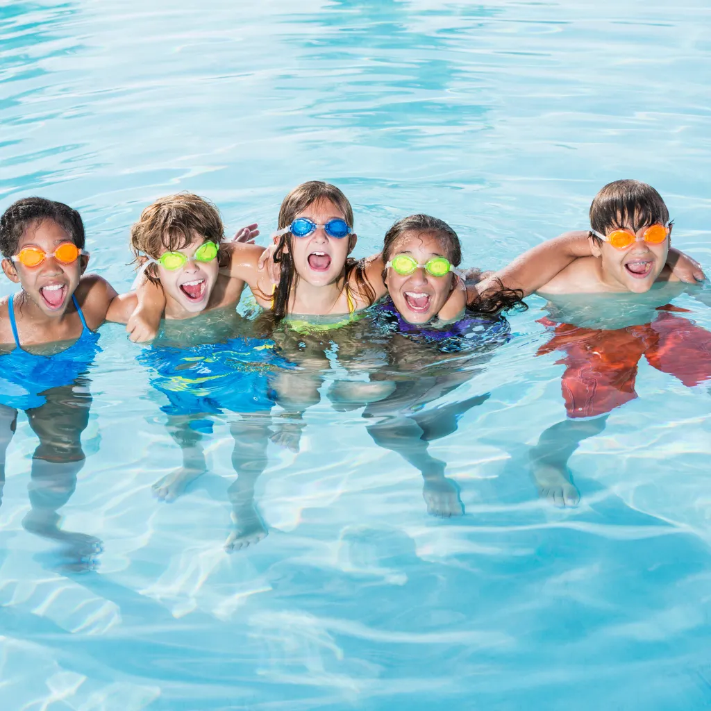 kids in swimming pool maintained by Altareeq